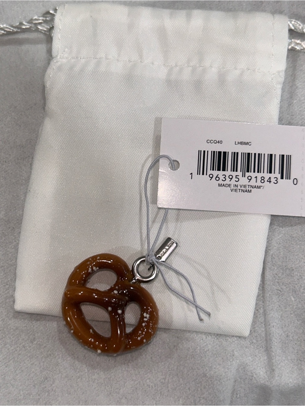 Coach Pretzel Charm with micro hang tag, care booklet, tag & Dust Bag. NWT - Picture 7 of 7
